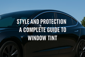 Glossy black car with dark window tint parked under the Tucson sun, showcasing modern style and UV protection.