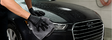 Car with paint protection film showing easy maintenance
