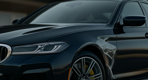 Luxury sports car with glossy paint protected by XPEL Ultimate Plus Paint Protection Film